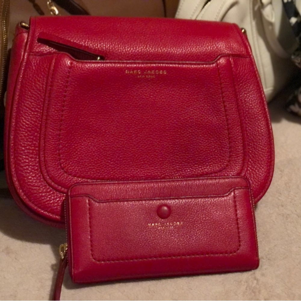 Marc Jacobs bag. Comes with matching wallet. Price is separate for the wallet.